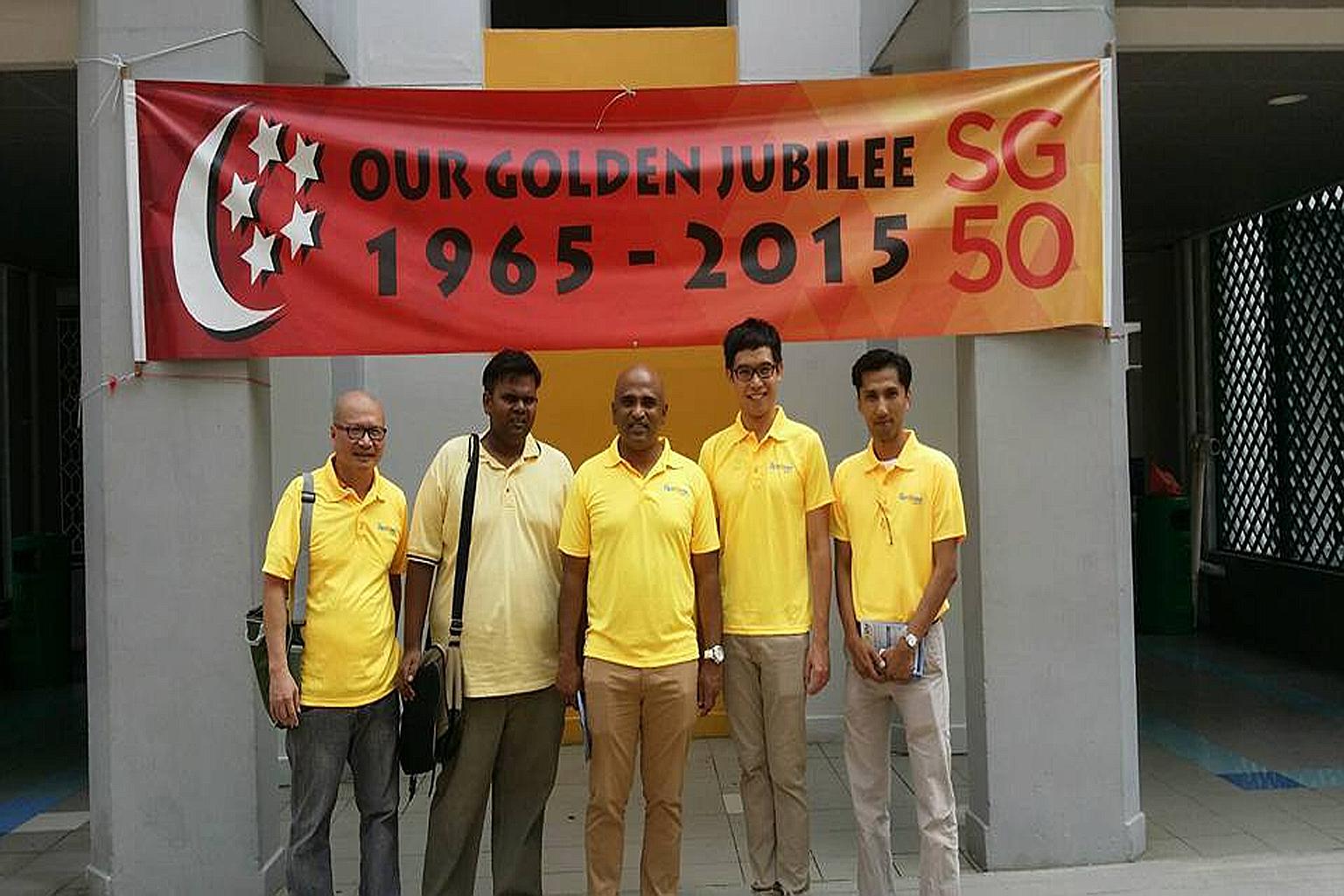 (From left) Mr Gilbert Ong, Mr Siva Chandran, Mr M. Ravi, Mr Roy Ngerng and Mr Osman Sulaiman wearing Reform Party T-shirts during their walkabout in Ang Mo Kio on Sunday. Mr Osman is likely to spearhead the party's Ang Mo Kio GRC team.