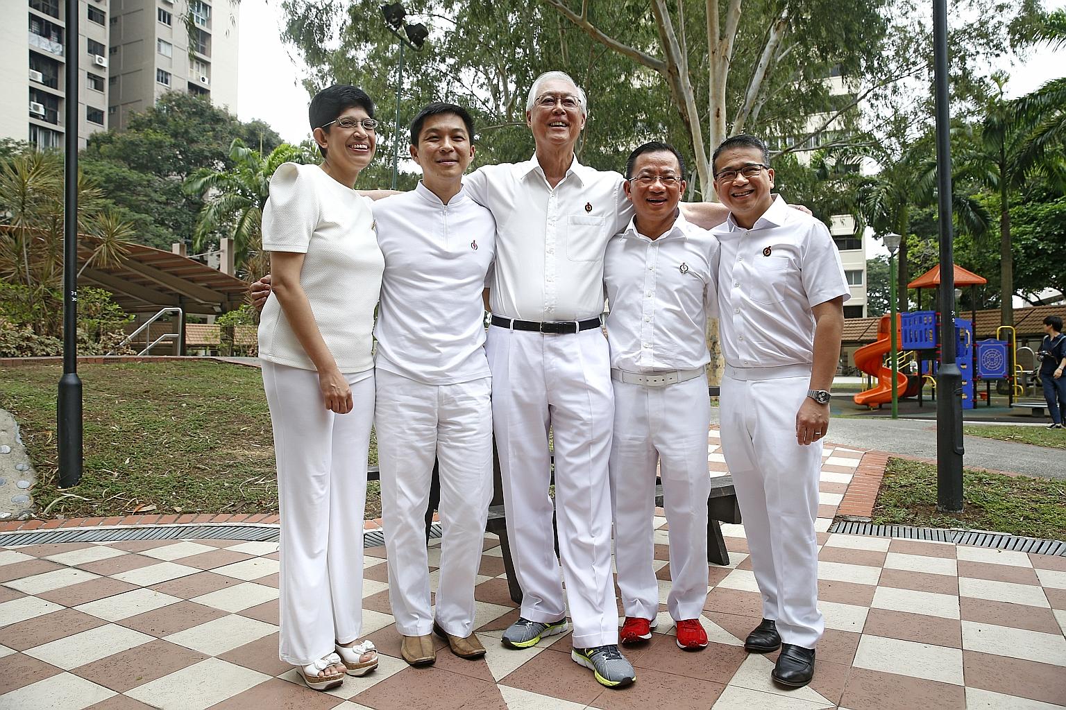 The People's Action Party candidates for Marine Parade GRC are (from left) Dr Fatimah Lateef, Mr Tan Chuan-Jin, ESM Goh Chok Tong, Mr Seah Kian Peng and Mr Edwin Tong. Mr Tan, the anchor minister, says the PAP government has to stay focused and do wh
