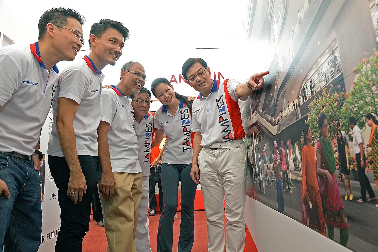 (From left) Mr Desmond Choo, Mr Baey Yam Keng, Minister in the Prime Minister's Office and Tampines grassroots adviser Masagos Zulkifli, Mr Mah Bow Tan, Ms Cheng Li Hui and Education Minister Heng Swee Keat at the Our Tampines Hub exhibition yesterda