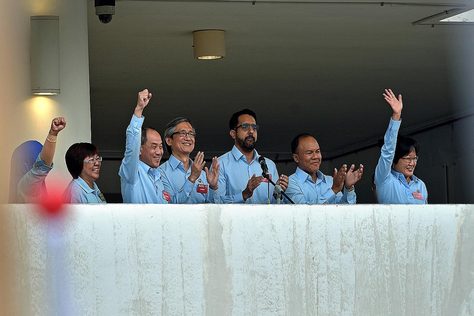 Mr Low Thia Khiang (second from left) yesterday with fellow Aljunied GRC candidates Chen Show Mao, Pritam Singh, Muhamad Faisal Abdul Manap and Sylvia Lim from the WP. The party is focused on a different timeframe - the four years since 2011 - to try