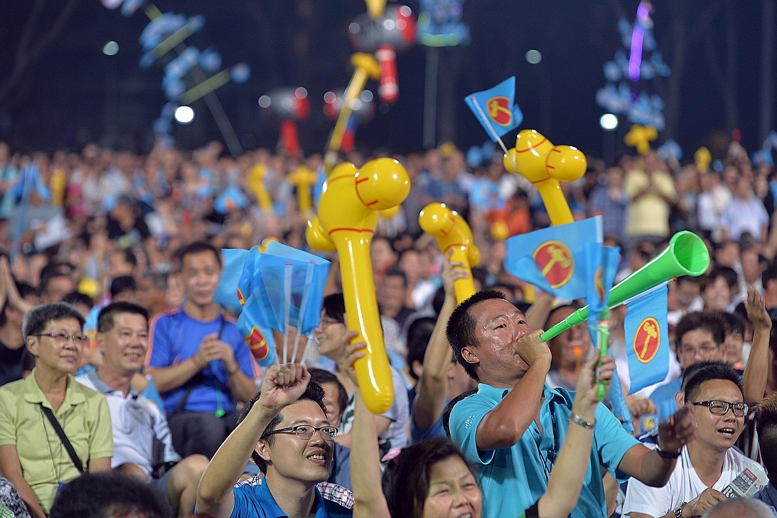 A section of the crowd at the Workers' Party's rally for Nee Soon GRC at Yishun Stadium last night. The party's MP for Hougang SMC, Mr Png Eng Huat, assured voters that the country would not come to a standstill if the PAP were not in power because t