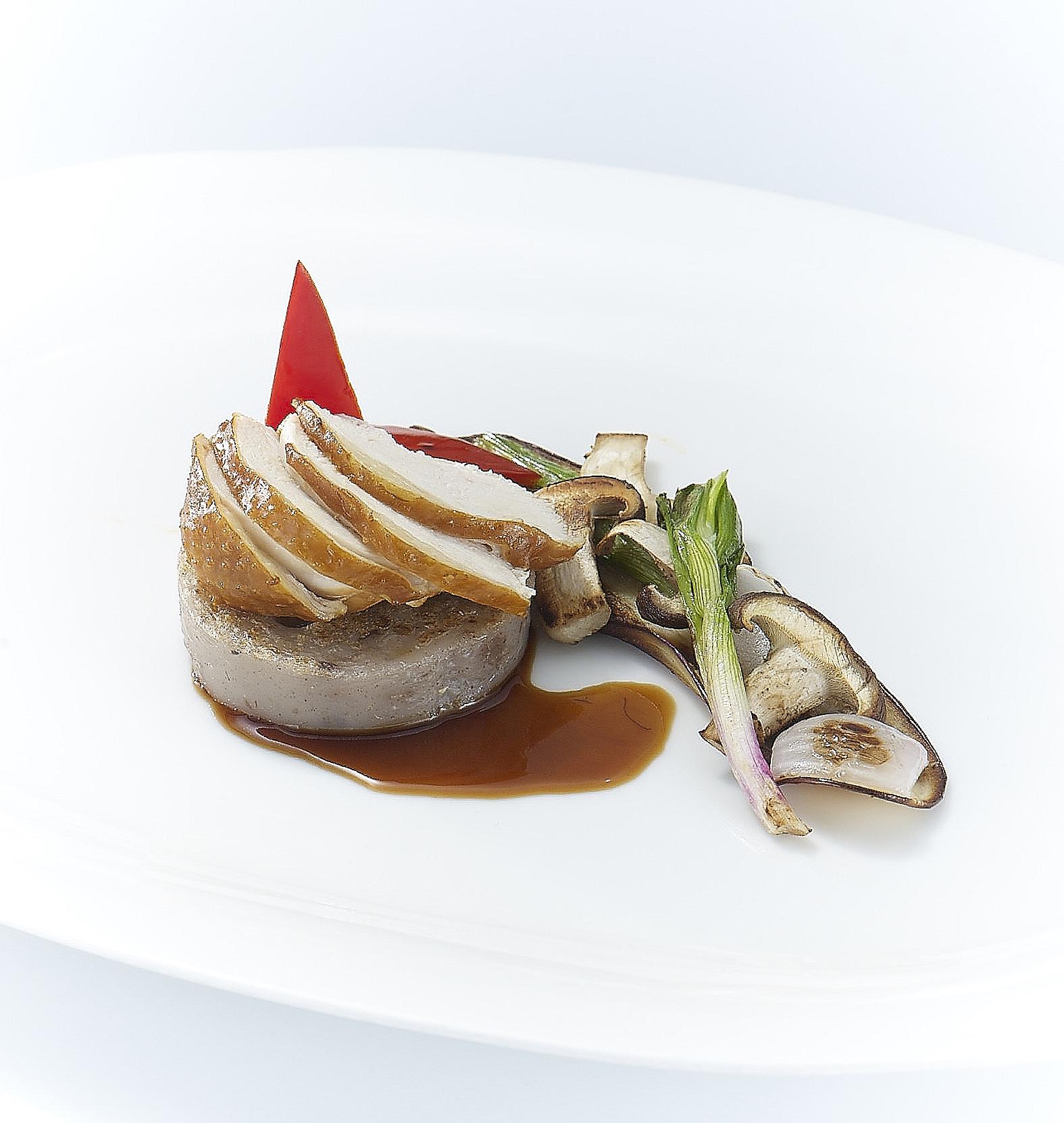 Soya chicken breast on pan-fried yam cake with grilled vegetables