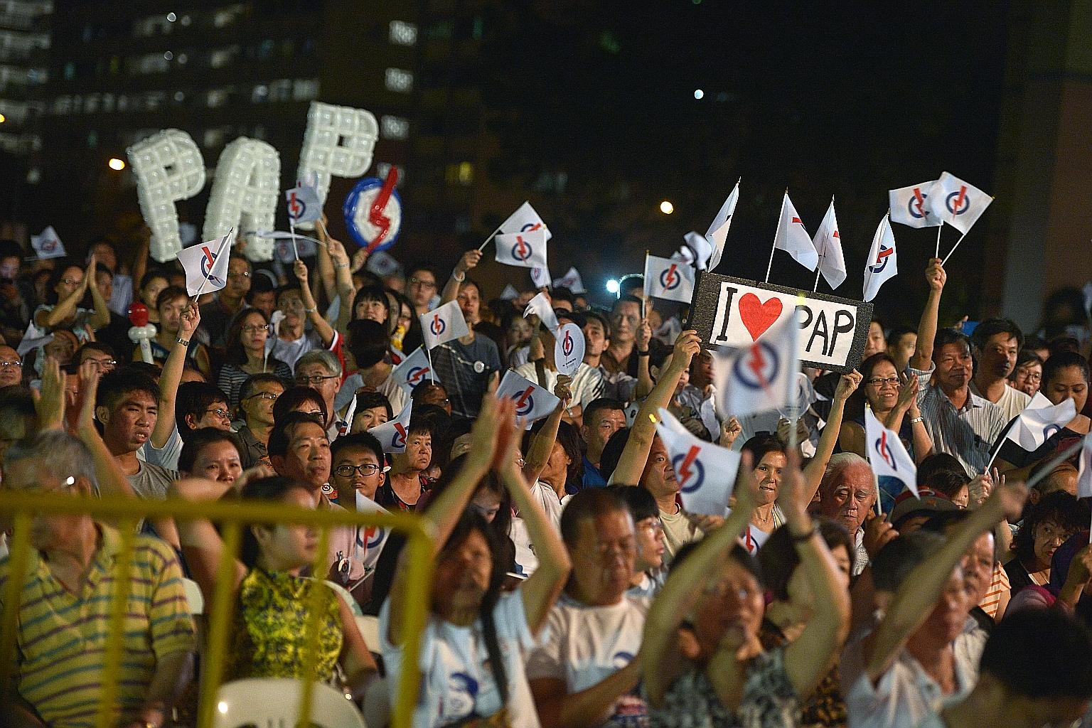 PAP supporters attending the party's rally for East Coast GRC, held in Simei, last night. Strong leadership today is different from strong leadership 20 or 30 years ago, said Deputy Prime Minister Tharman Shanmugaratnam, adding that a changed PAP is 