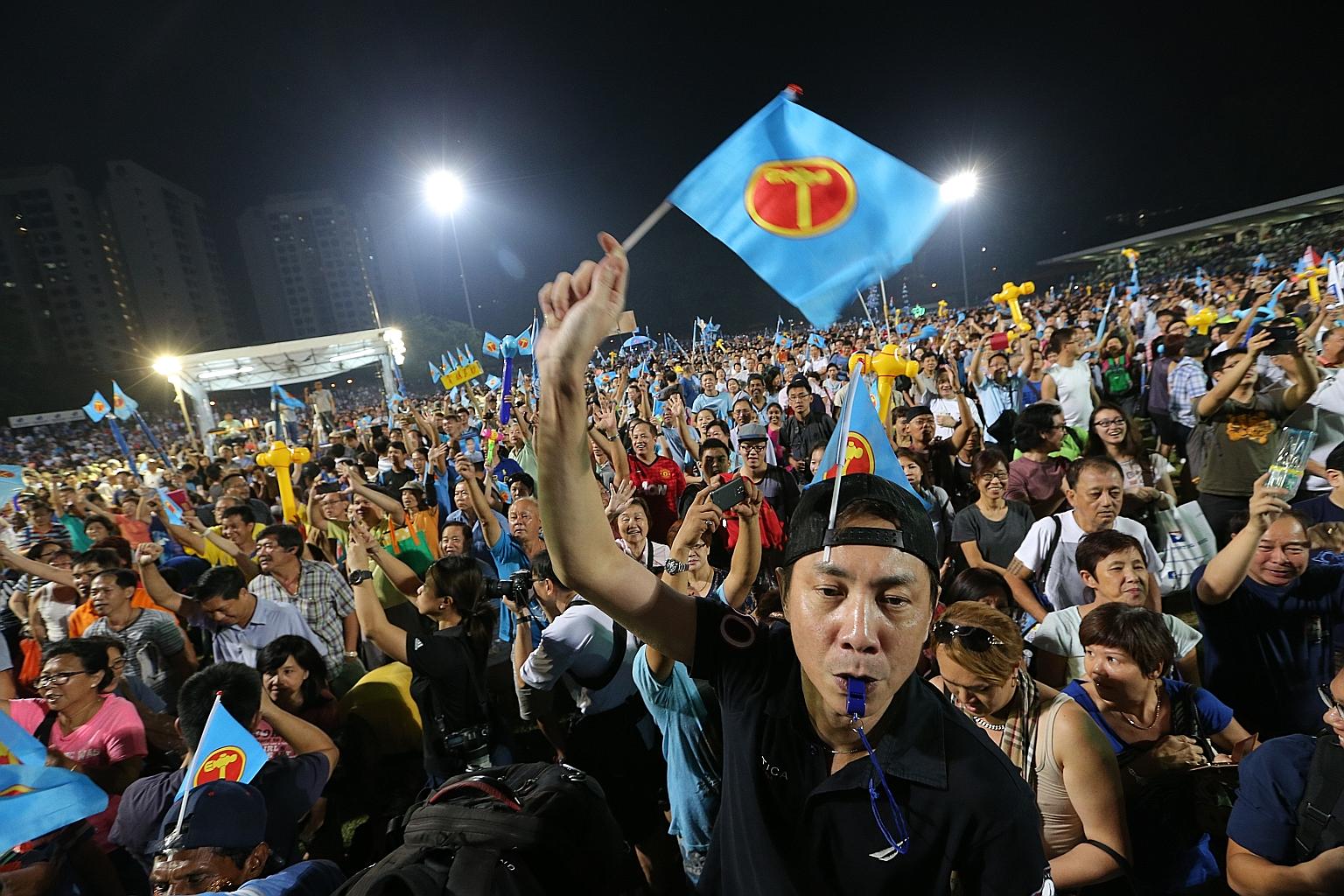The crowd at the Workers' Party rally for East Coast GRC at Bedok Stadium last night. Party chief Low Thia Khiang appealed to voters, saying the WP needs quality and quantity to effectively engage the PAP in Parliament as it does not have government