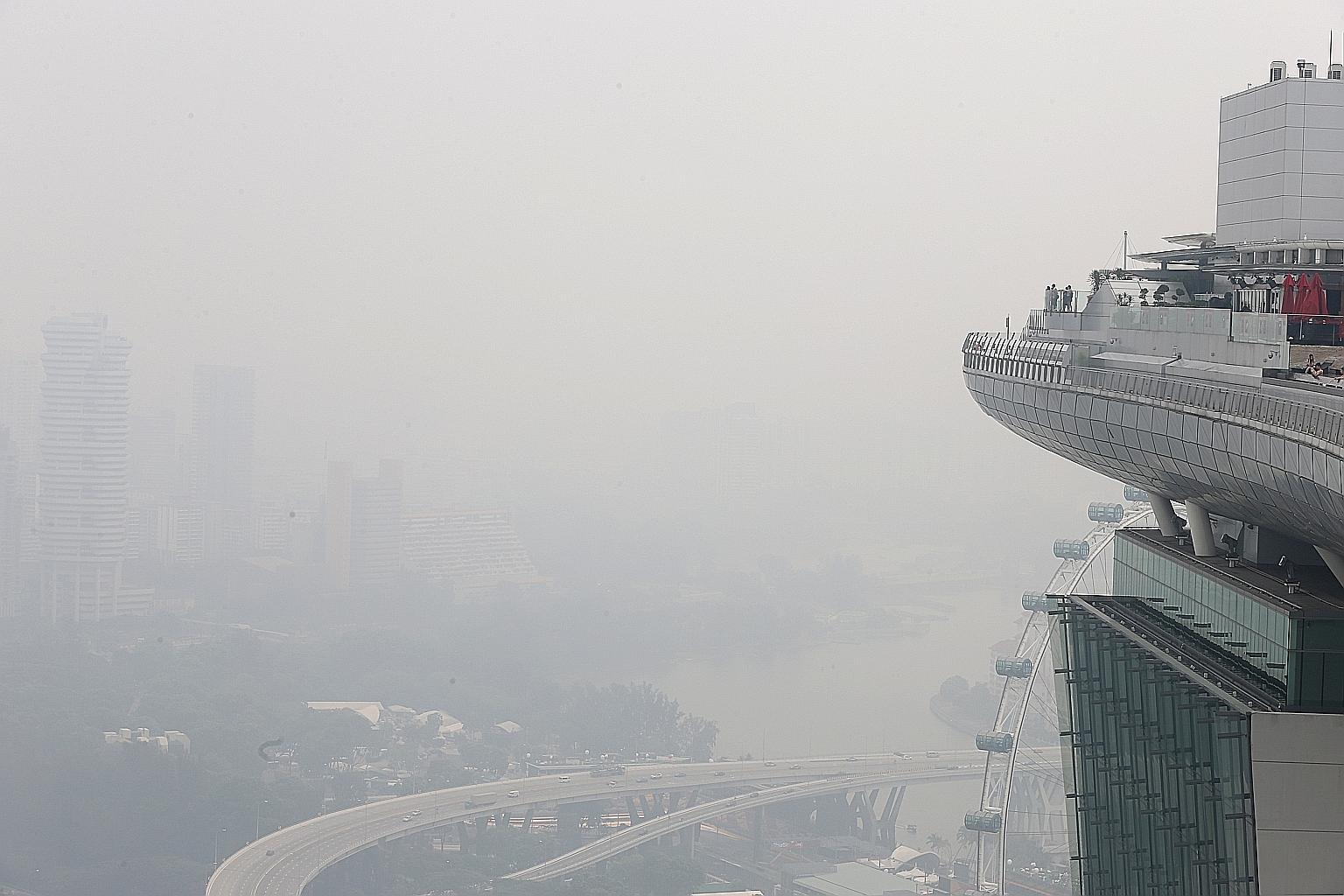 The Marina Bay area shrouded in haze at about 10.30am yesterday, as seen in this photograph taken from Marina Bay Sands.