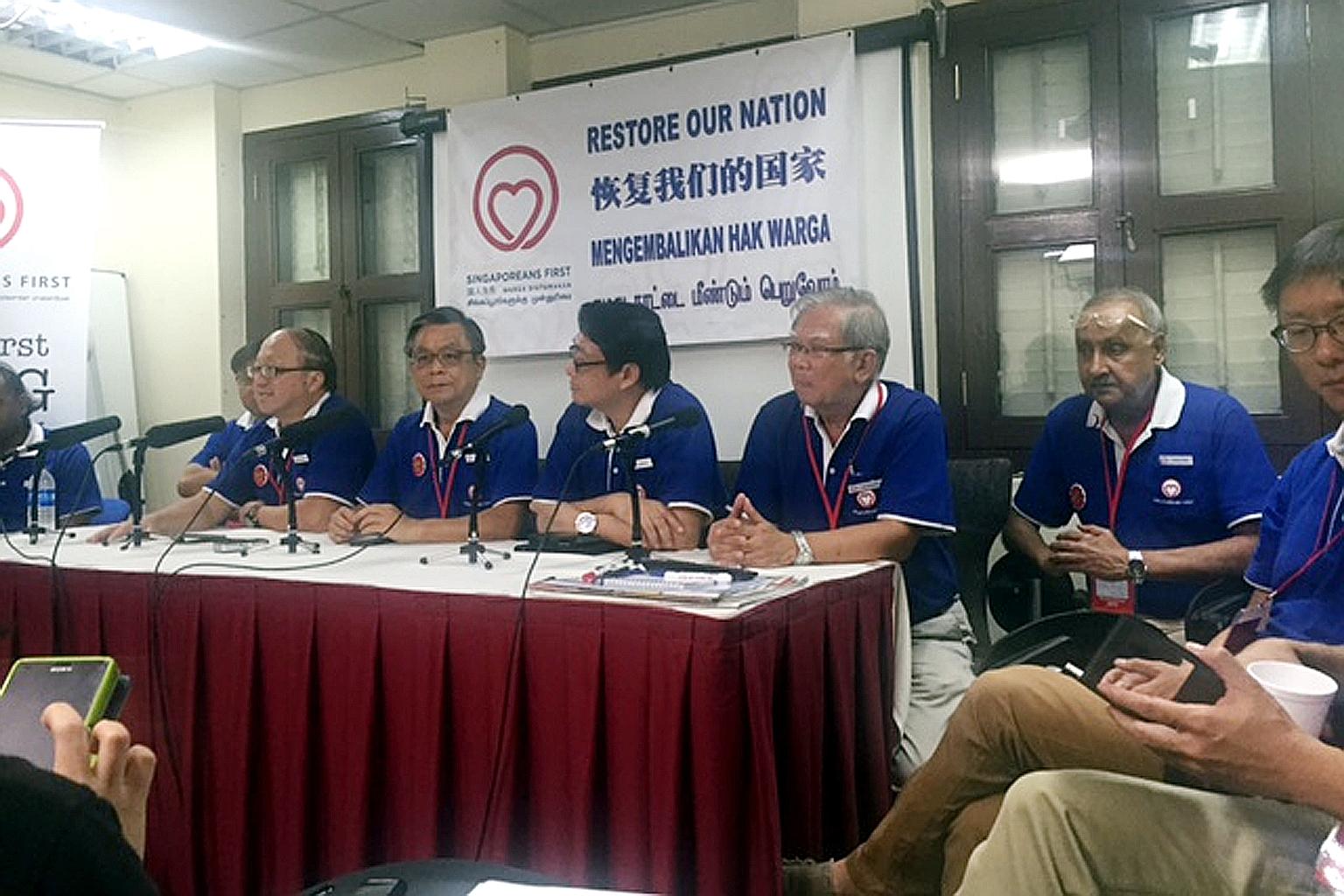 The mood was sombre as SingFirst's party members held a press conference at its operations centre in Tras Street.