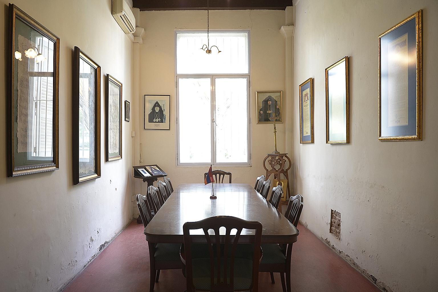 A meeting room on the ground floor of the parsonage in Hill Street. On its walls are portraits of leaders in the Armenian faith, and pictures from the Armenians' culture and history.