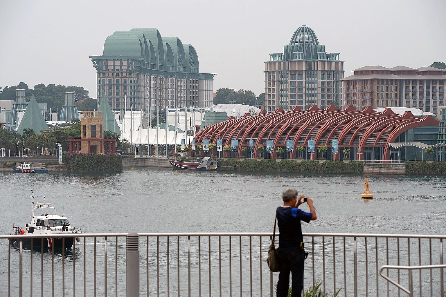 A view of Resorts World Sentosa seen from VivoCity yesterday - a less hazy day. Last Saturday night, the 24-hour PSI moved into the unhealthy range, easing into moderate levels only at 10am yesterday.