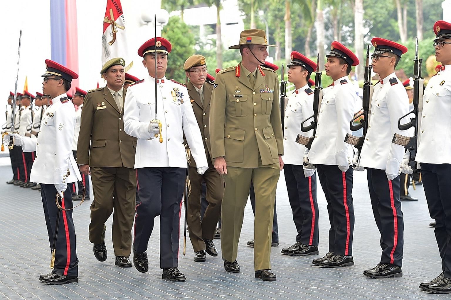 The Chief of Army of the Australian Defence Force, Lieutenant-General Angus Campbell, inspected a guard of honour at the Ministry of Defence (Mindef) yesterday. His trip to Singapore is part of an introductory visit that started on Thursday and ends 
