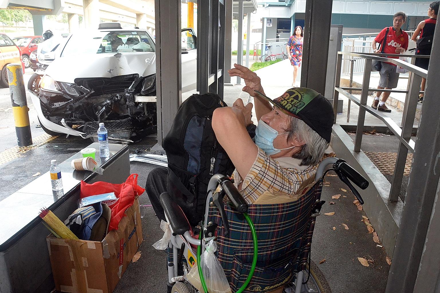 A wheelchair user had a lucky escape when a taxi crashed into a taxi stand outside a shopping mall and stopped just 2m away from him. Mr Yao Long Xiang, 69, could not react as quickly as other passers-by, who fled as the Mercedes-Benz rammed into a m