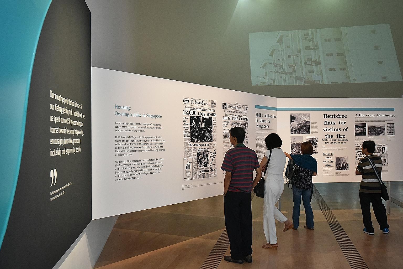 Visitors at The Straits Times' exhibition at the ArtScience Museum. According to an ongoing visitors' survey, those who have seen the exhibition gave it an average rating of 4.07 out of five points.