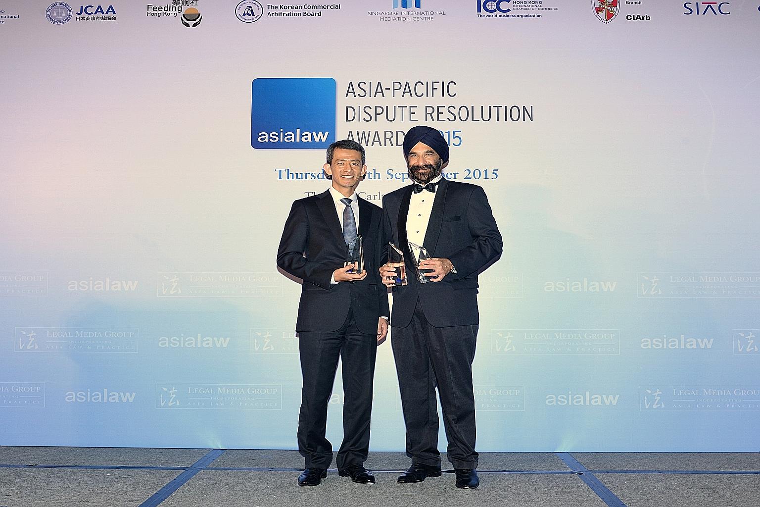 Senior Counsel Davinder Singh (right) was named Singapore's "Disputes Star of the Year" at a Hong Kong event. Senior Counsel Cavinder Bull received Drew & Napier's awards.