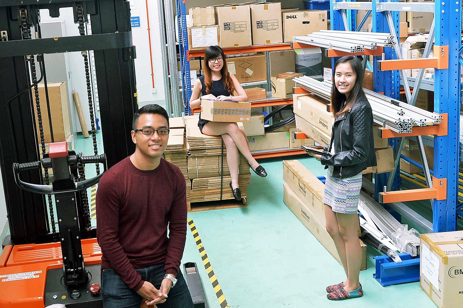 (From left) Mr Muhammad Nazmi Mohamed Zaaini, 23, Ms Tan Li Qi and Ms Brenda Cheng Bifeng, both 21, are part of the first batch of polytechnic graduates in the SkillsFuture Earn and Learn scheme. They started classes at Republic Poly yesterday. The 1
