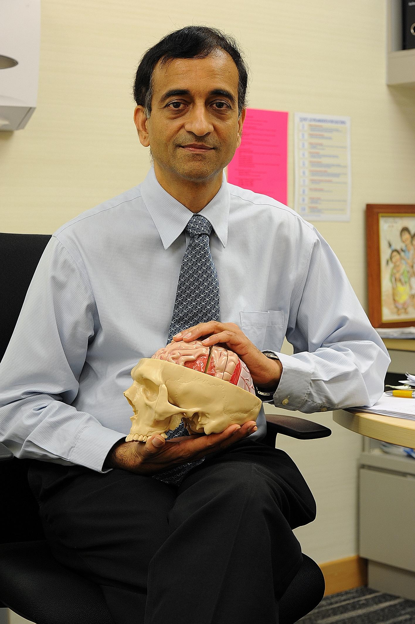 Besides running his clinic in Raffles Hospital, Dr N. Venketasubramanian Ramani goes to the National University of Singapore to teach students and attend meetings with research colleagues.