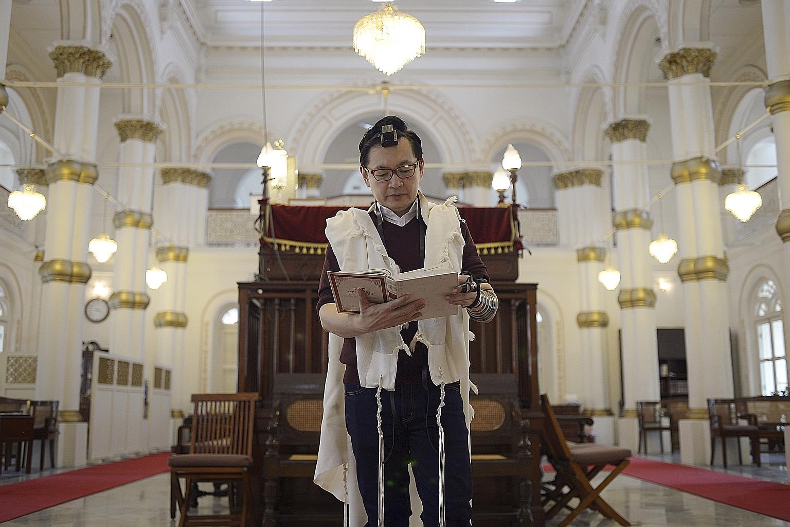 Radio producer and presenter Andrew Lim at the Chesed-El Synagogue in Oxley Rise. The 48-year-old, whose wife and three children are also Orthodox Jews, said the teachings of the faith resonate strongly with him.
