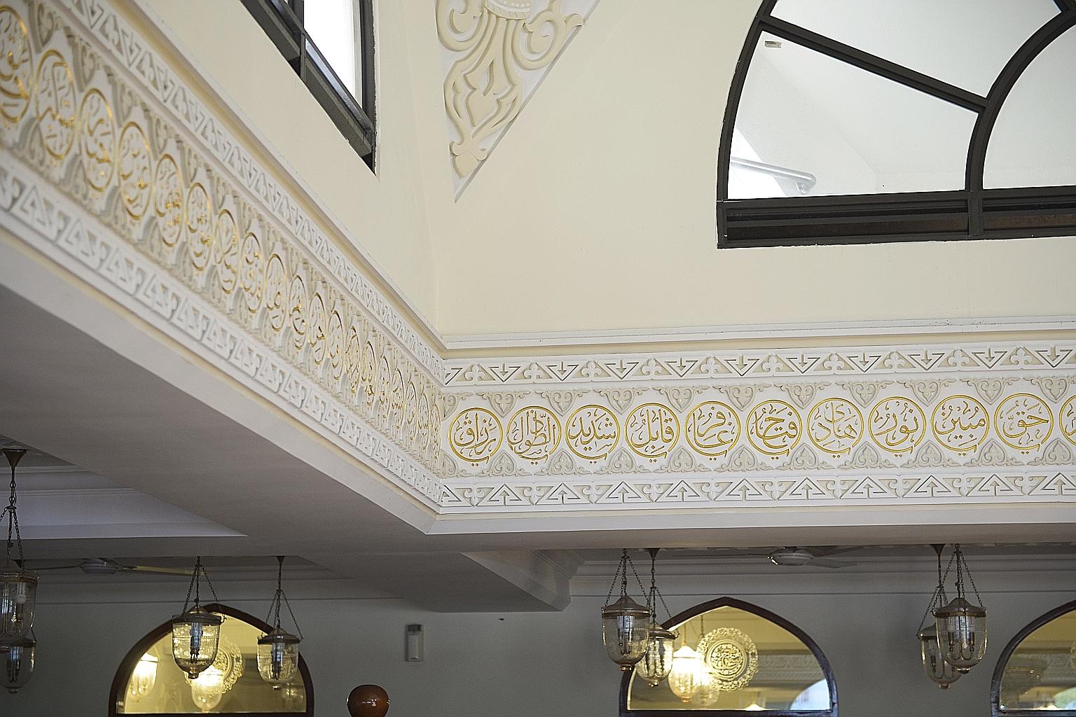 (Above): Gilded inscriptions of the different names of Allah adorn the Masjid al Burhani in Hill Street. The prayer hall consists of two floors - the upper storey for the women and the ground floor for the men. (Right): Men from the Dawoodi Bohra com