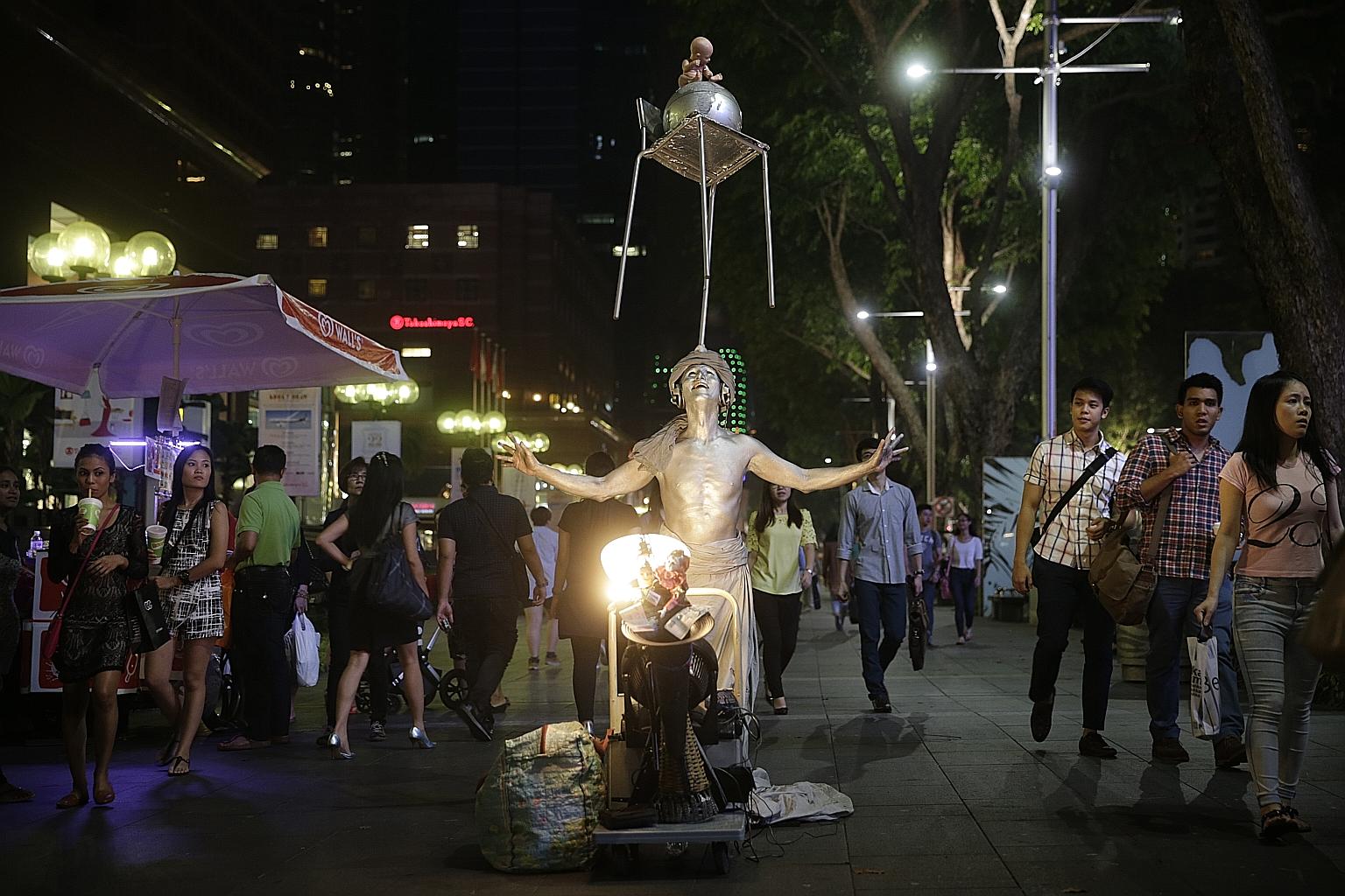 Busker Roy Payamal performing outside Ngee Ann City earlier this month. Mr Payamal will be starring in a film called Singapore Minstrel, which will be shown in this year's Singapore International Film Festival.