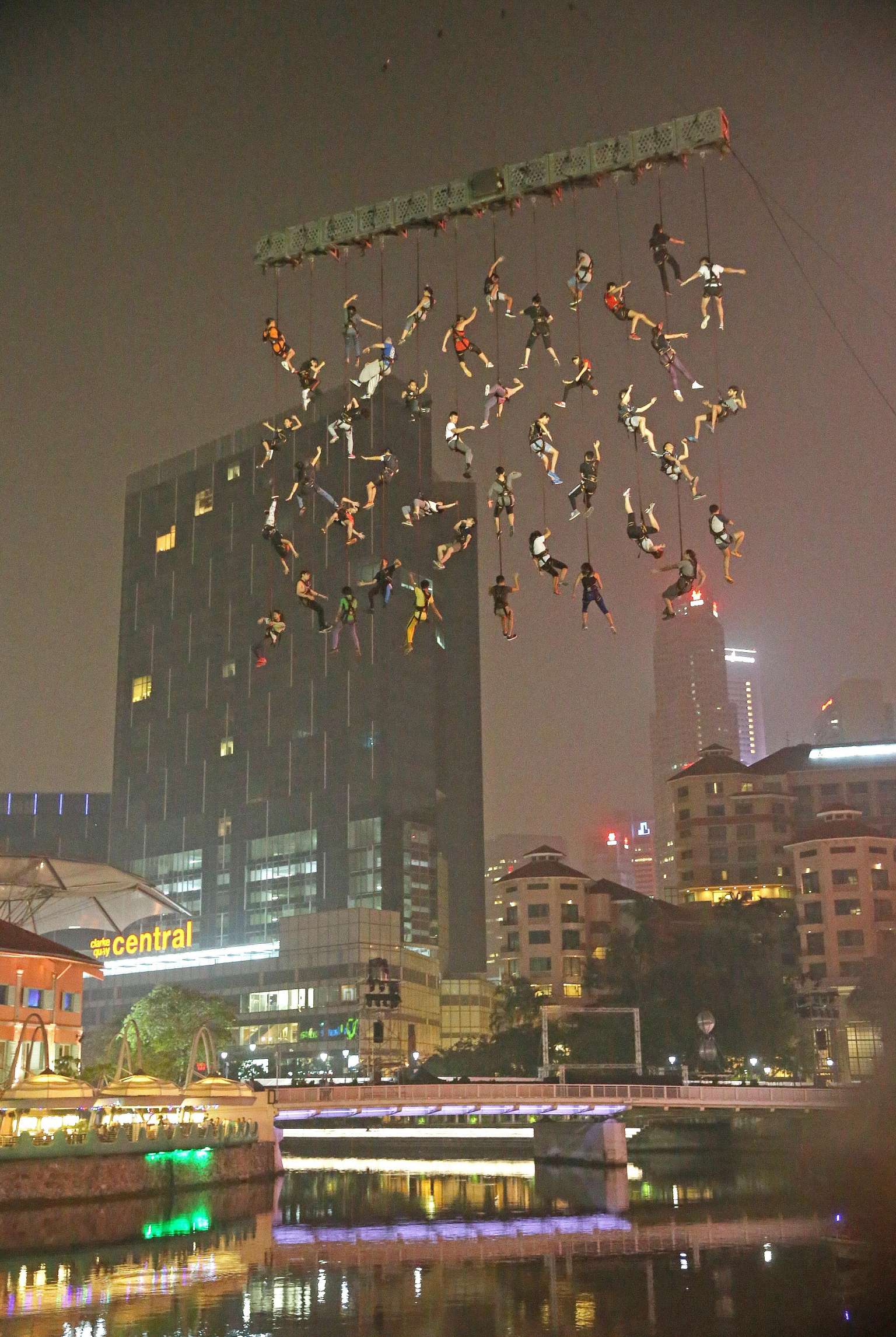 Forty-two brave souls - all volunteers and based in Singapore - rehearsing for the death-defying Human Net performance over the Singapore River on Tuesday night. The act is part of Spanish performance troupe La Fura dels Baus' showcase for the three-