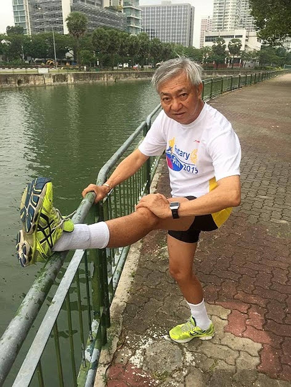 Mr Henry Tan wakes up very early two to three times a week to run at 6am. He enjoys spending time with his family and playing with his granddaughter.