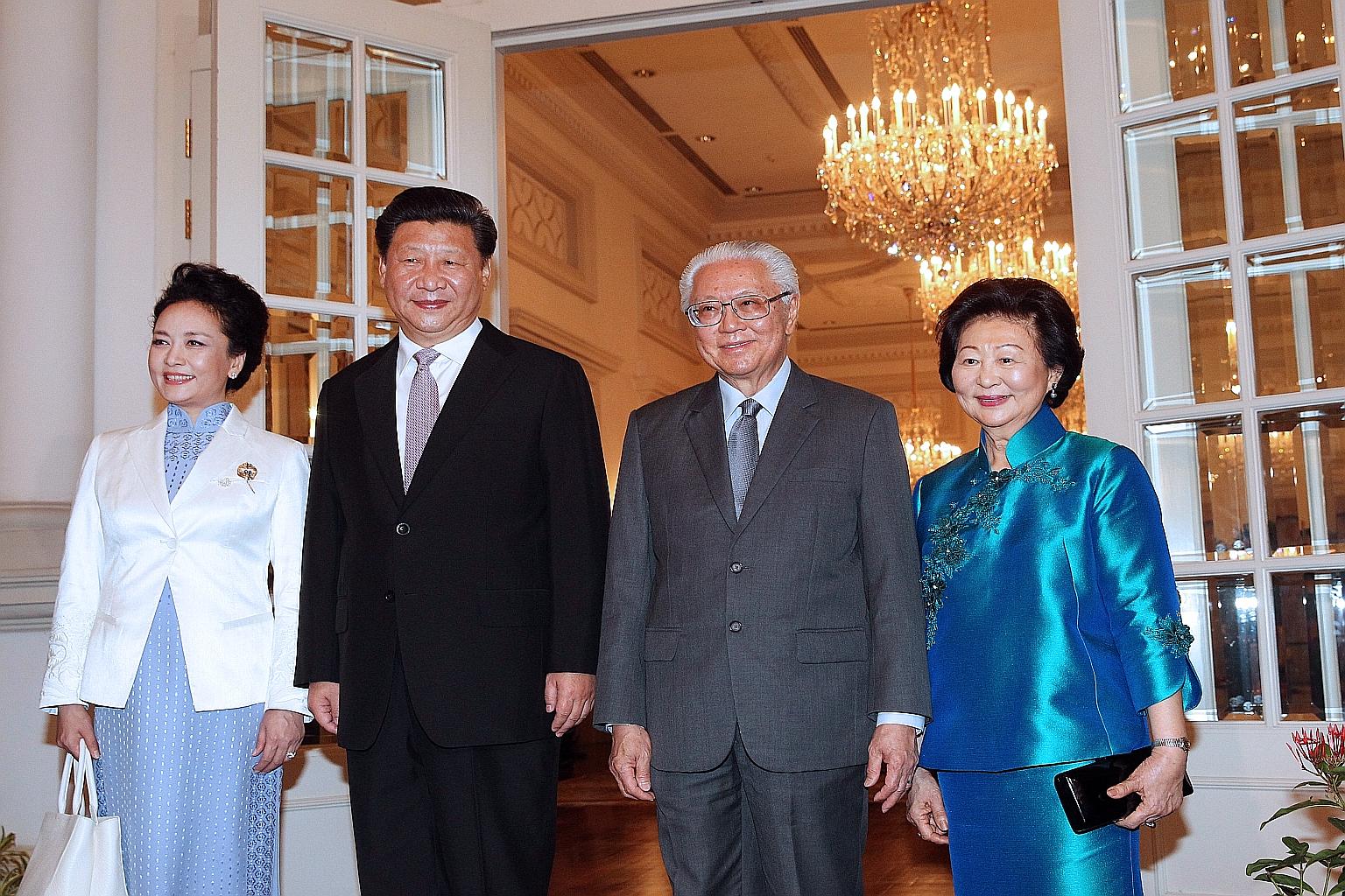 (From far left) Madam Peng Liyuan, Chinese President Xi Jinping, President Tony Tan Keng Yam and Mrs Mary Tan at the Istana yesterday. Mr Xi arrived yesterday for a two-day state visit to mark 25 years of diplomatic relations between China and Singap