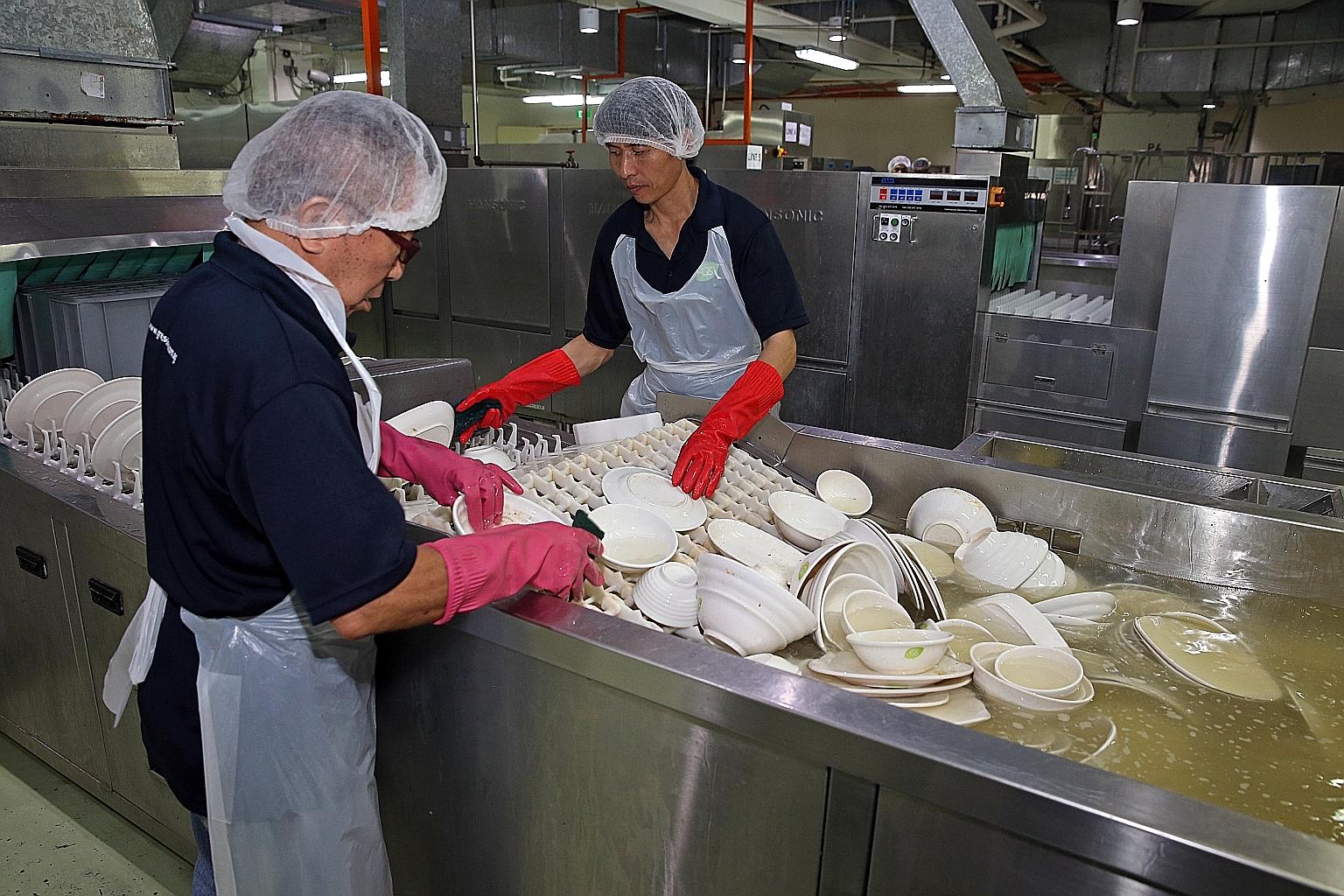 The soaking zone at the centralised dishwashing facility at IMM, which is operated by GreatSolutions. The facility has seven semi- automated dishwashing lines, including a separate line for crockery from halal-certified eateries.