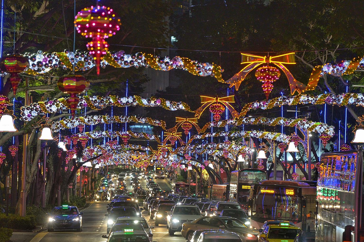 Singer-composer Dick Lee and designer Yang De Rong came up with this year's light-up concept, which revolves around bells and baubles.