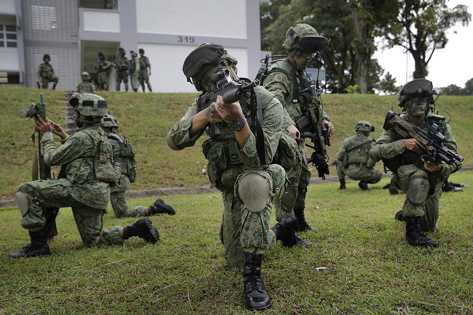Soldiers preparing for a drill during a military exercise last month. The last time NS allowances were raised was in 2012, when they went up by $60.