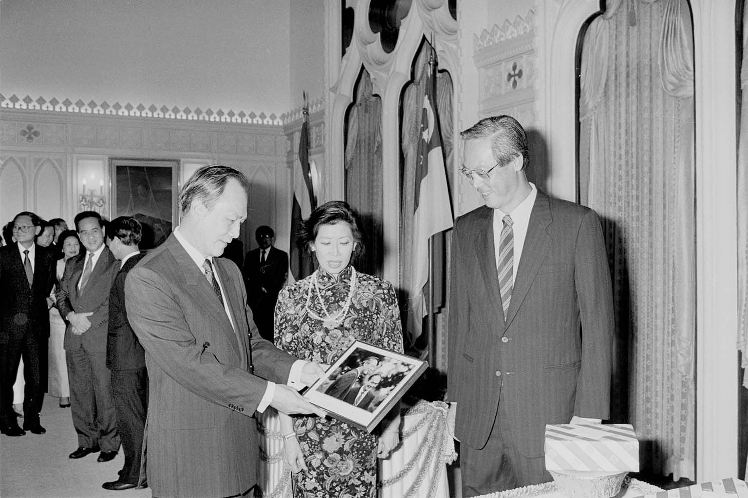 Mr Goh Chok Tong's FTA approach began in the early 1990s, when he worked closely with then-Thai Prime Minister Anand Panyarachun (left) to launch an Asean Free Trade Area in 1992. The two leaders are photographed here in 1991 with Mrs Goh Chok Tong. 