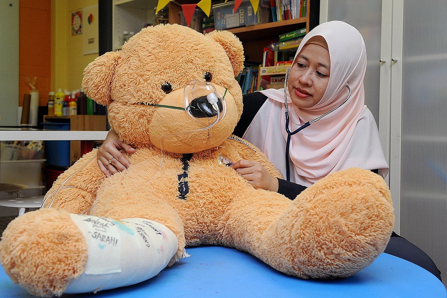 National University Hospital senior child life specialist Fadzilah Kamsin, 35, focuses on the psycho-social needs of children who require medical treatment.