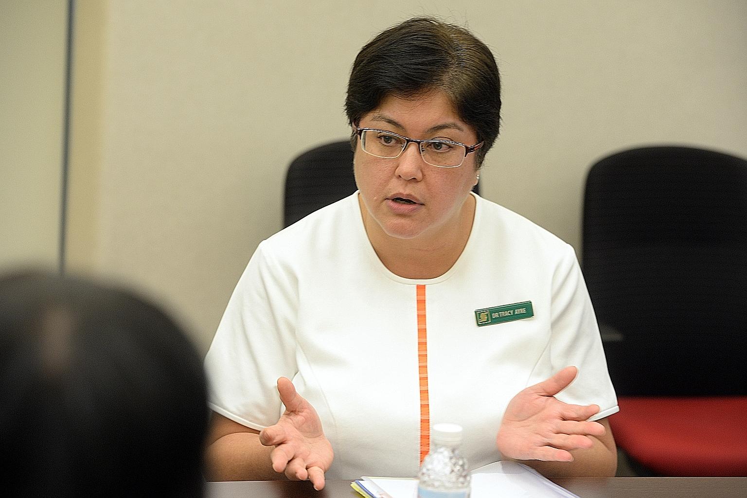SGH chief nurse Tracy Carol Ayre (right) and her team "have been working tirelessly to strengthen and tighten the infection control practices and standards for many months", said Ms Tan Soh Chin, the Health Ministry's chief nursing officer, in a Face