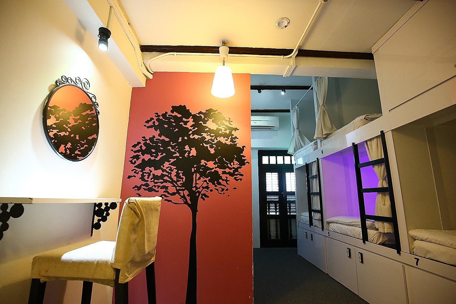 Wink Hostel, which opened in 2011 in Chinatown, is believed to be the first capsule hostel here. Sleeping spots (right) have room for a ledge, and spacious lockers for luggage. Each capsule measures about 1.2m in height and width, and is about 2m lon