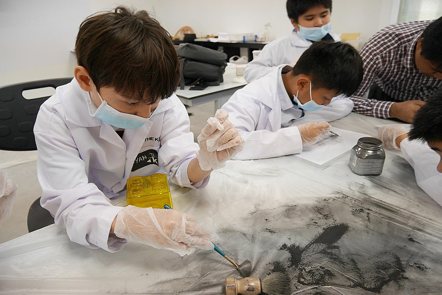 As part of The Keys Academy's holiday workshop, CSI: Murder Mystery, participants learnt about fingerprint dusting and the science concepts behind it, while trying to solve a "murder".