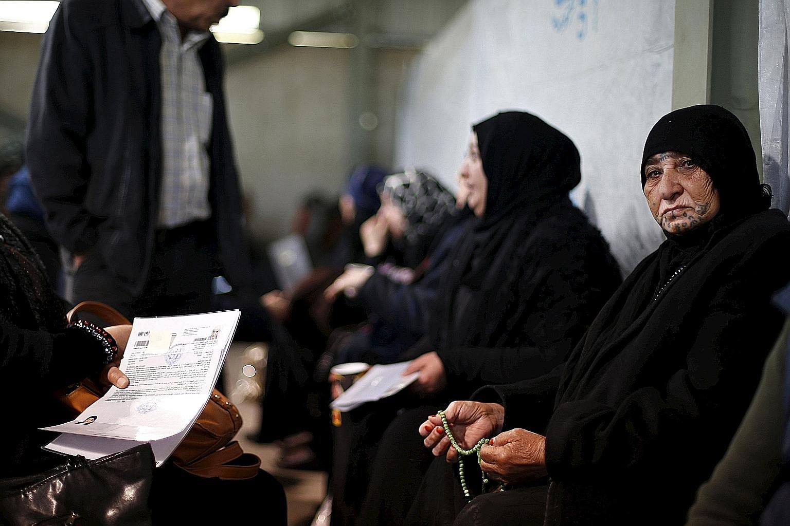 Syrian refugees waiting to register at the office of the UN High Commissioner for Refugees in Amman, Jordan, last week.