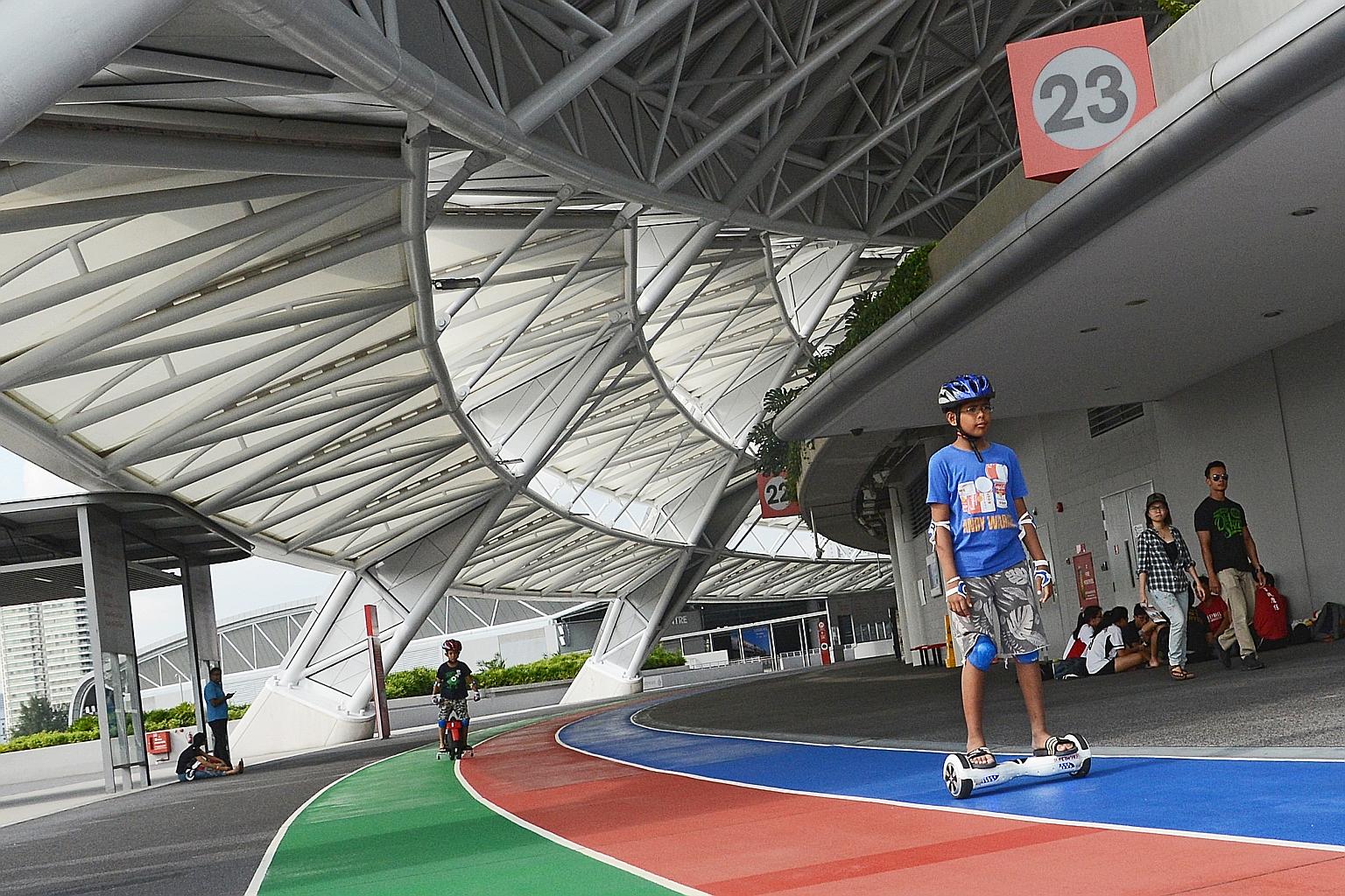 Ten-year-old Ren Imaizumi riding a hoverboard at the Sports Hub. There have been reports of such devices exploding.