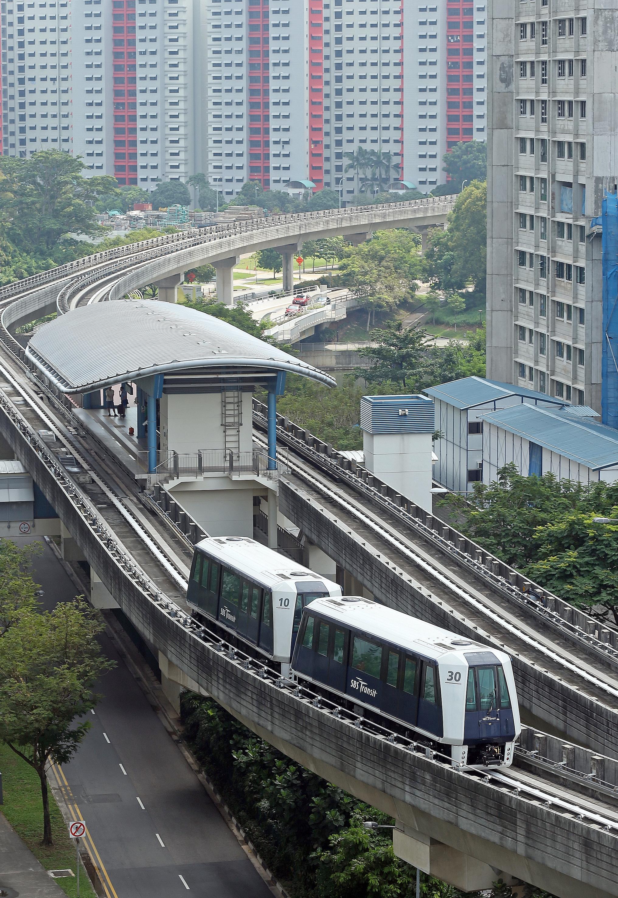 A two-car train at Layar LRT station yesterday. The original trains were fitted with couplers to allow more carriages to be added. Eventually, 16 of the system's 41 trains will have two cars.