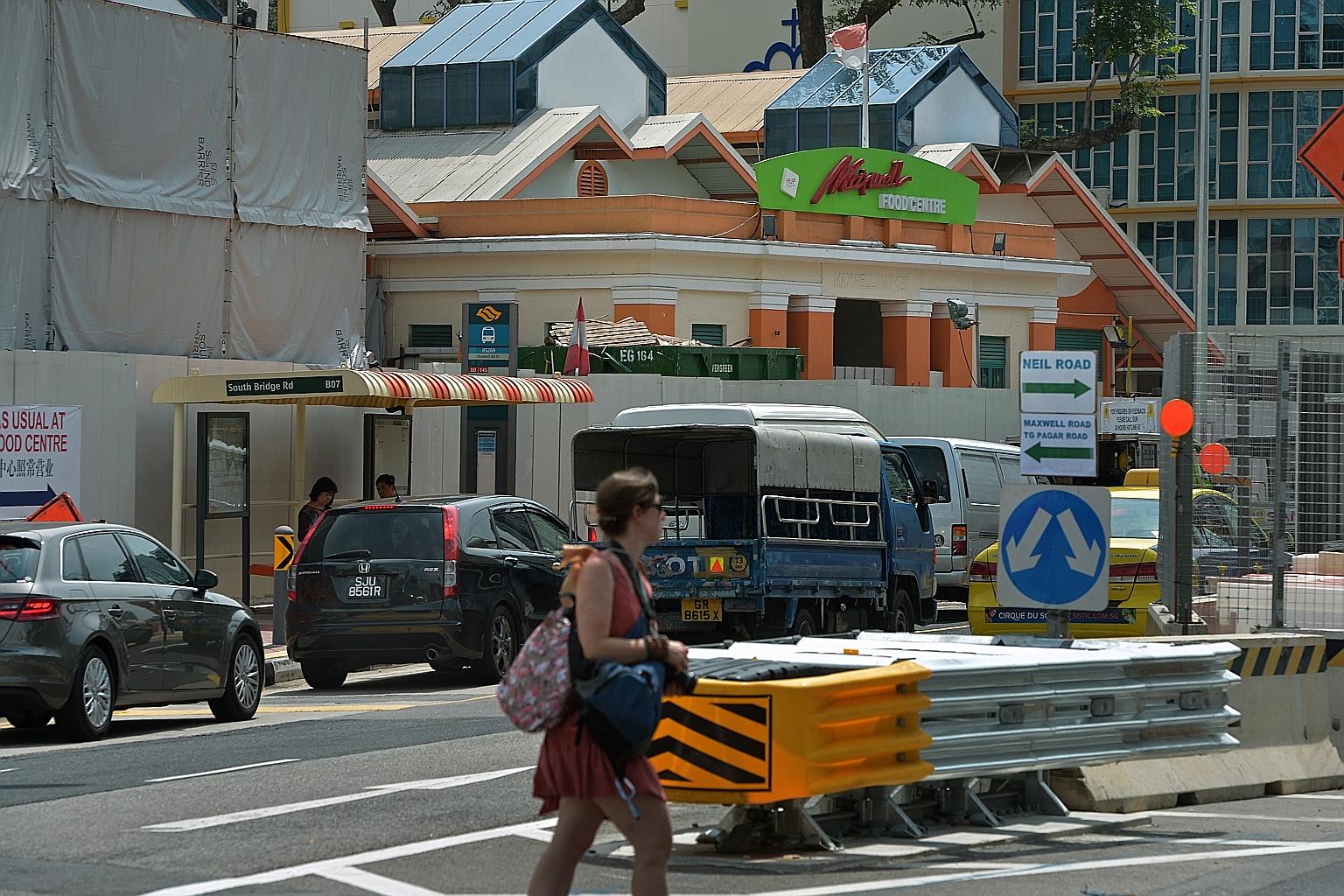 Hoardings around Maxwell Food Centre have given visitors the impression that the food centre, which has over 100 stalls, is closed.