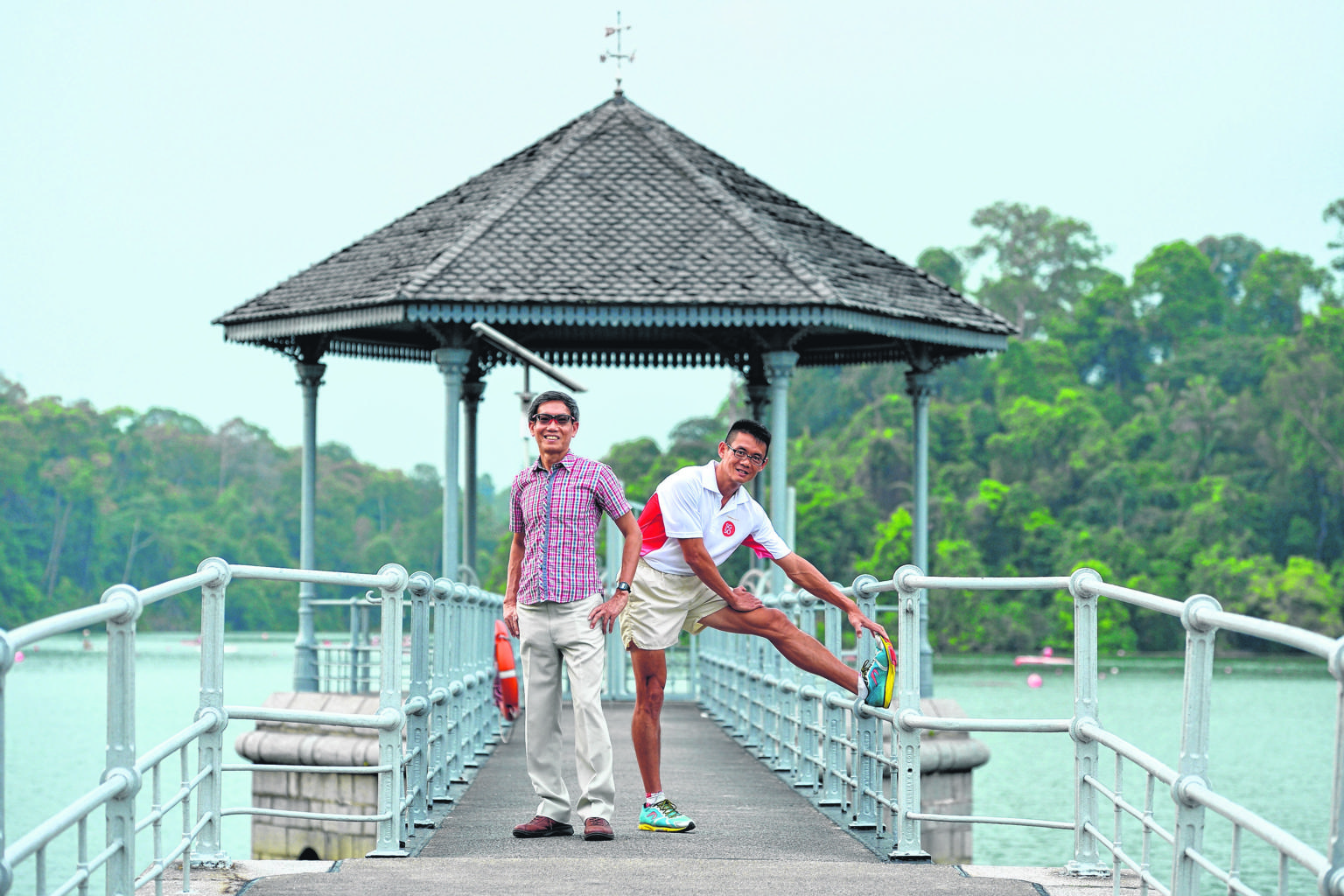 Mr Yong (right) and Mr Lim ran 2,500km - 50km daily over 50 days - to mark SG50.