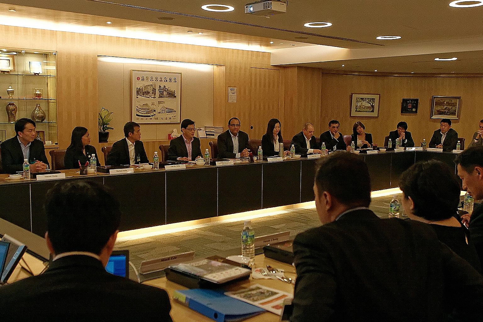 The Future Economy committee members include (from left) ST Engineering president and CEO (designate) Vincent Chong, Boston Consulting Group partner and managing director Mariam Jaafar, JobsCentral Group co-founder and former CEO Lim Der Shing, Finan