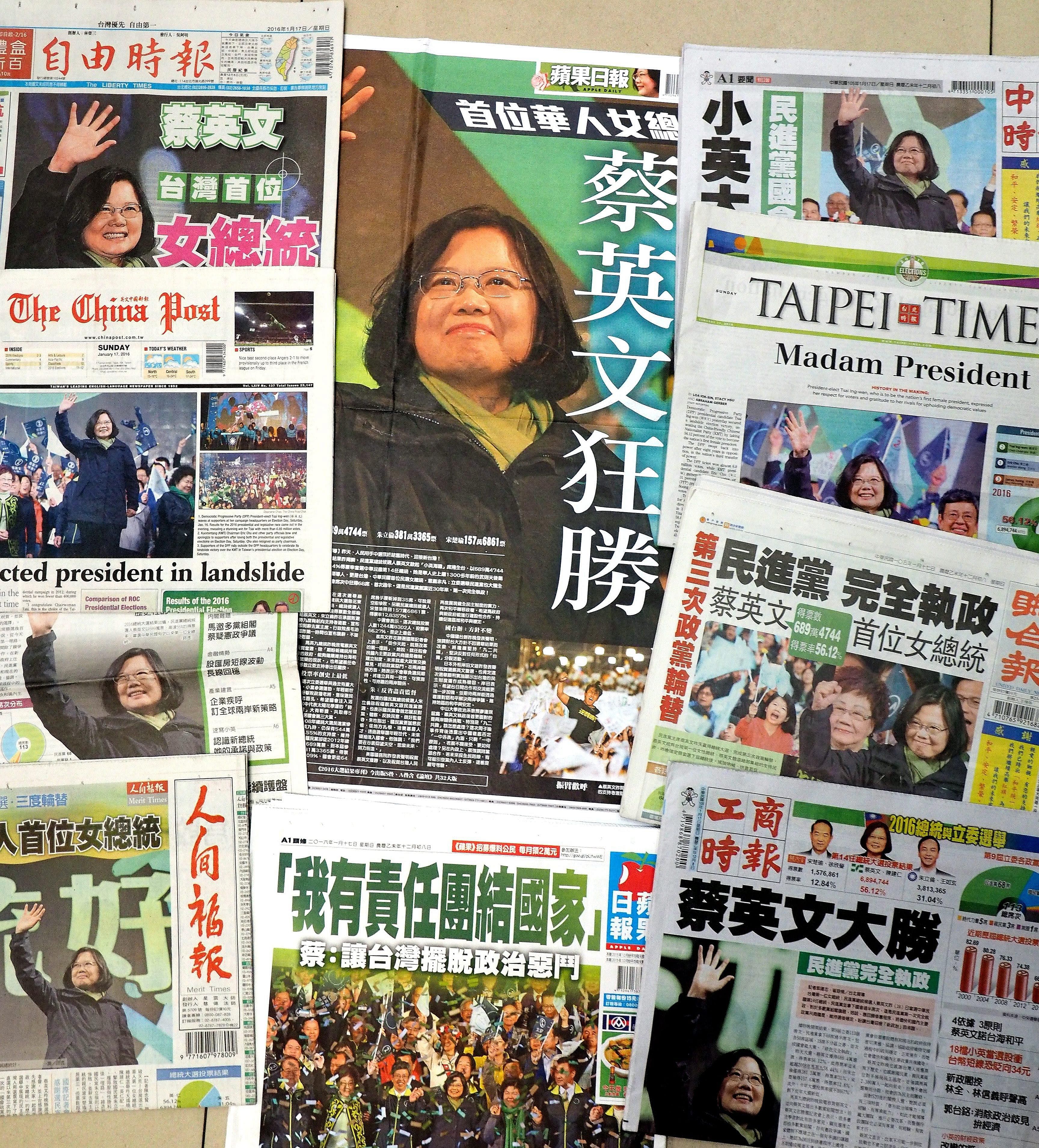 Taiwanese newspapers' front pages yesterday reporting on opposition leader Tsai Ing-wen's presidential election win.