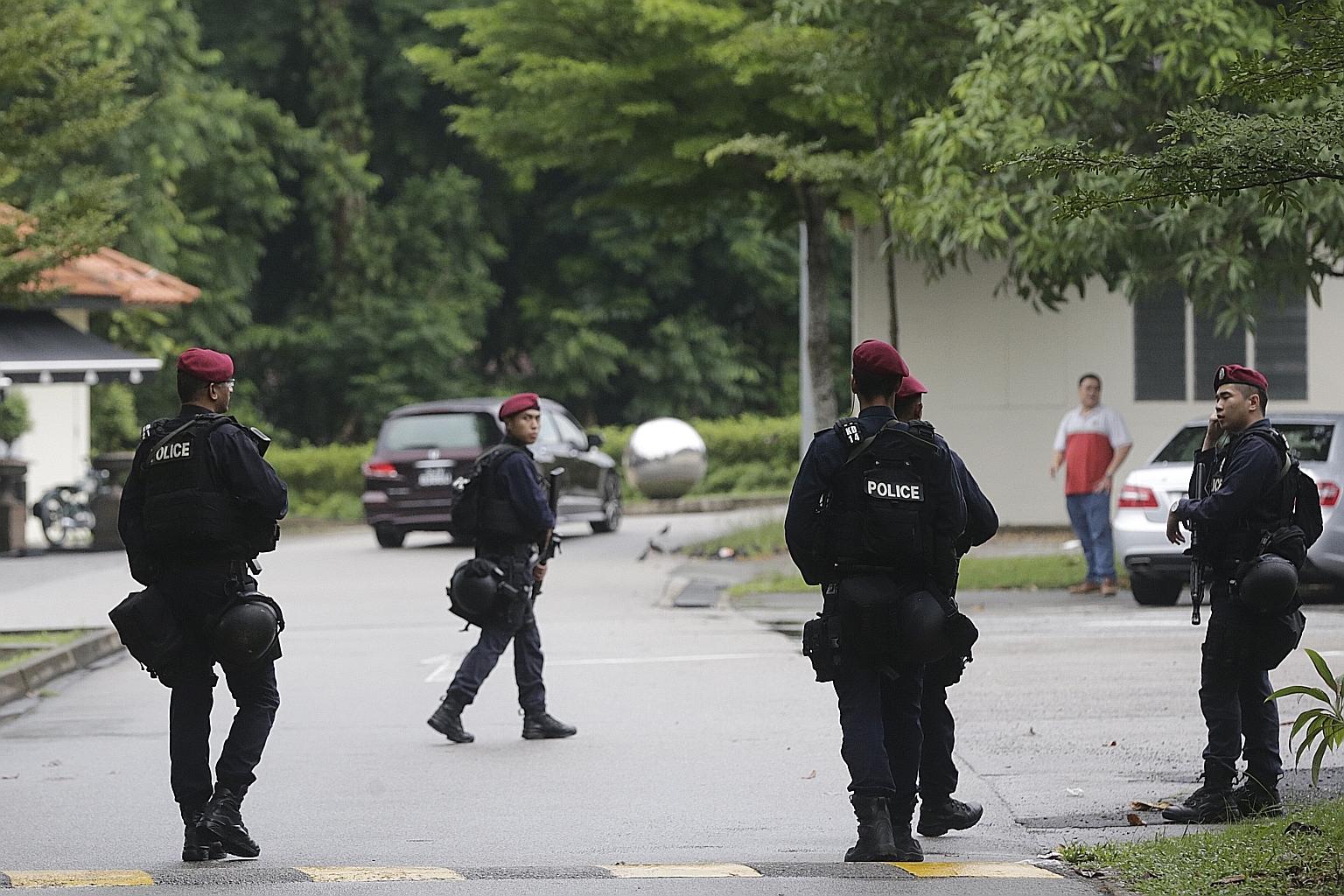Security personnel on patrol in Dempsey Road in November last year. Beyond its investments in hardware and capabilities, the Government will also look at ways to strengthen society's resilience - a "key ingredient" in national security, says Deputy P