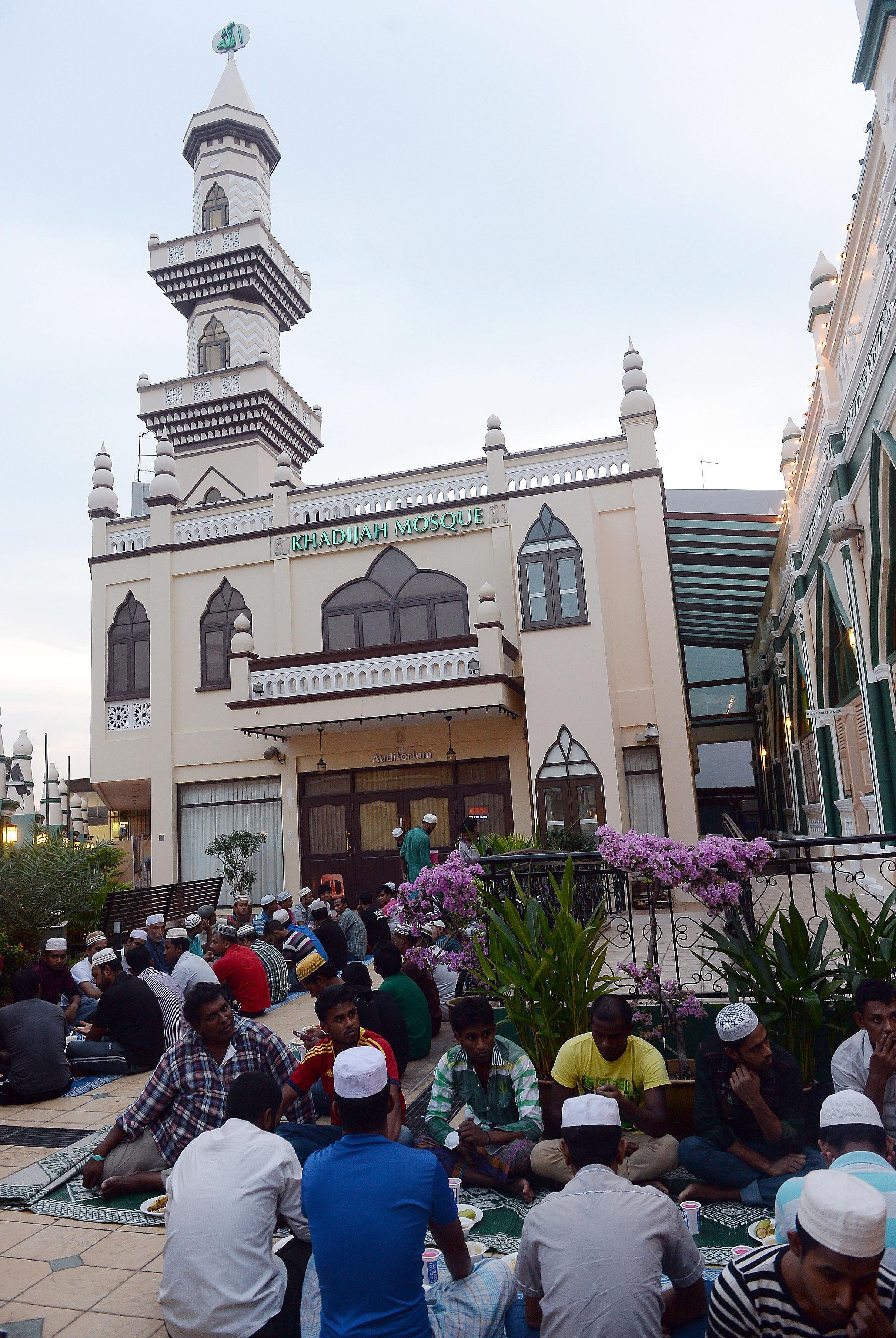 Some Bangladeshi workers breaking fast at Khadijah Mosque. It is vital Singaporeans do not tar Bangladeshis with the same brush and regard them as terrorists, says Parliamentary Secretary for Home Affairs Amrin Amin.