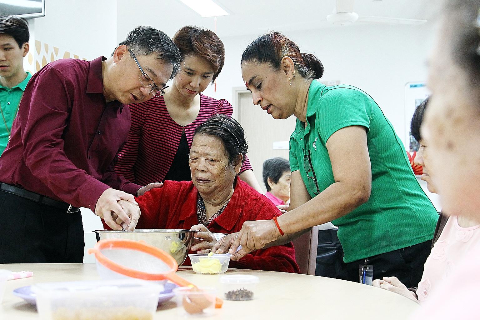 Mr Gan at the official opening of Ren Ci @ Bukit Batok St. 52. The new nursing home has a senior care centre within its grounds, with help for the elderly such as day and dementia day care, and day rehabilitation services. With Mr Gan is MP Low (in r