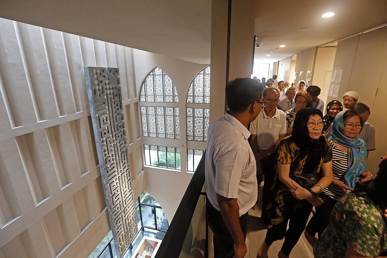 People ona guided tour in Al-Islah Mosque for residents of all races and religions last Saturday.Dr Maliki saysif there is an abrupt end to social harmony in Singapore, everyone will suffer. Every group needs to make the effort to understand the othe