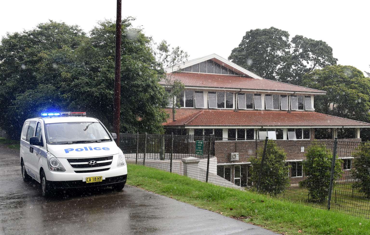 Police officers patrol Sydney Girls High School following a threat on Feb 1, 2016.