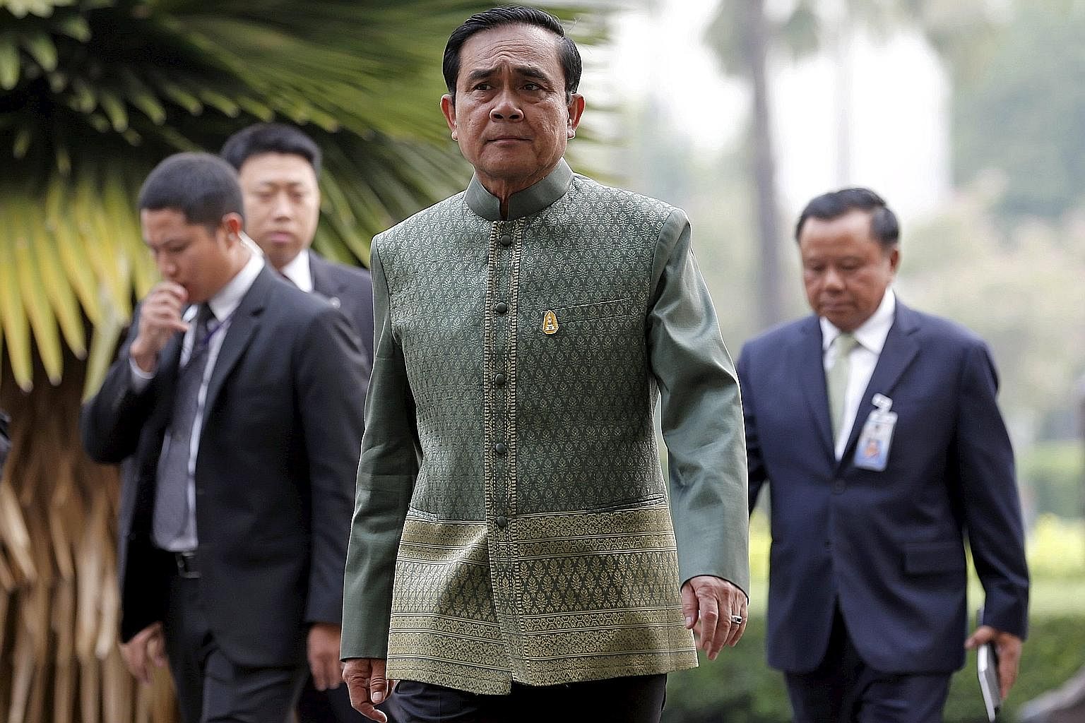 Thailand's Prime Minister Prayut Chan-o-cha arriving for a Cabinet meeting at Government House in Bangkok this week. While analysts say Thailand's generals are in no hurry to hand over power, the lower-than-expected economic growth of about 2.8 per c