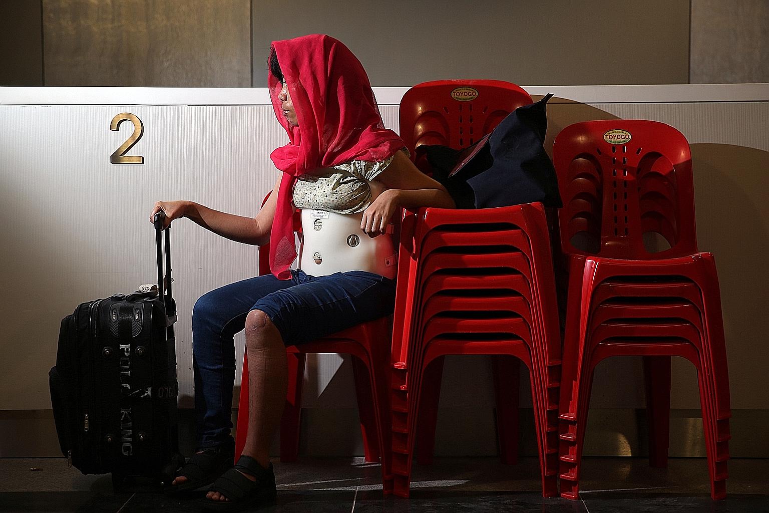 Ms Rindu ended up with a broken lip and leg fracture - and now has eight rings attached to her spine to hold it in place. She also has to wear a waist brace.