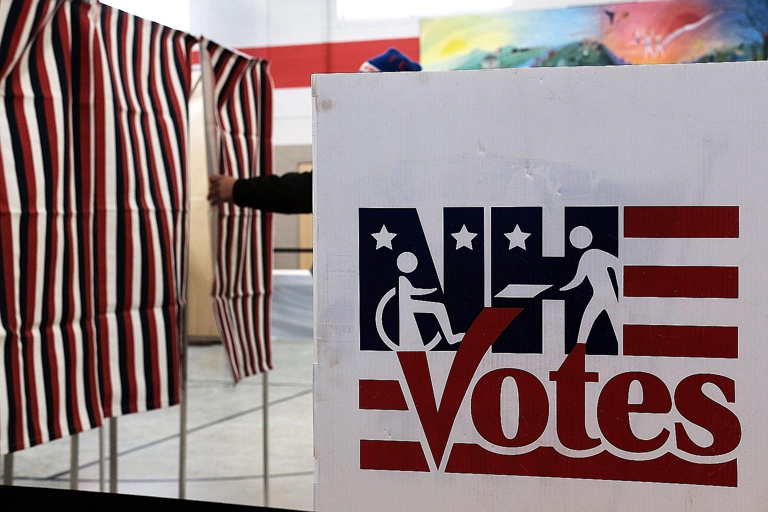 People voting inside a middle school that served as a voting station on Tuesday, the day of the New Hampshire primary. The political spotlight now moves to South Carolina for the Republicans, and to Nevada for the Democrats.