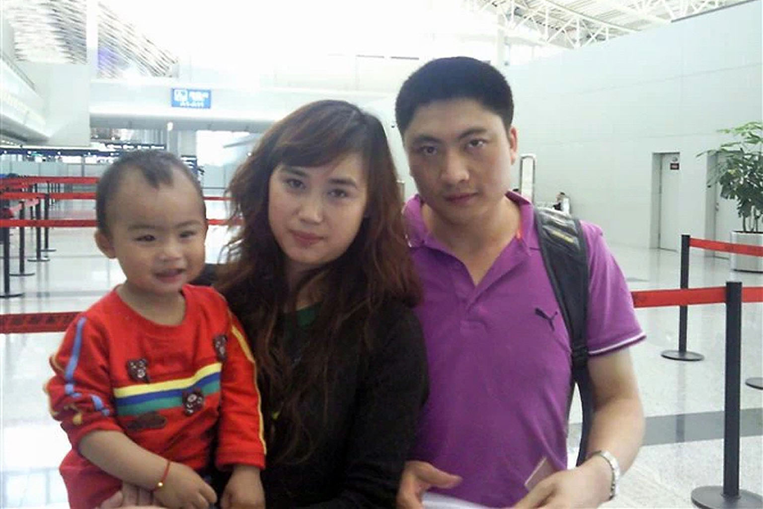 A photo of Mr Gu, Madam Kong and their older son taken around six years ago when Mr Gu returned to China. Their two sons are now aged four and seven.