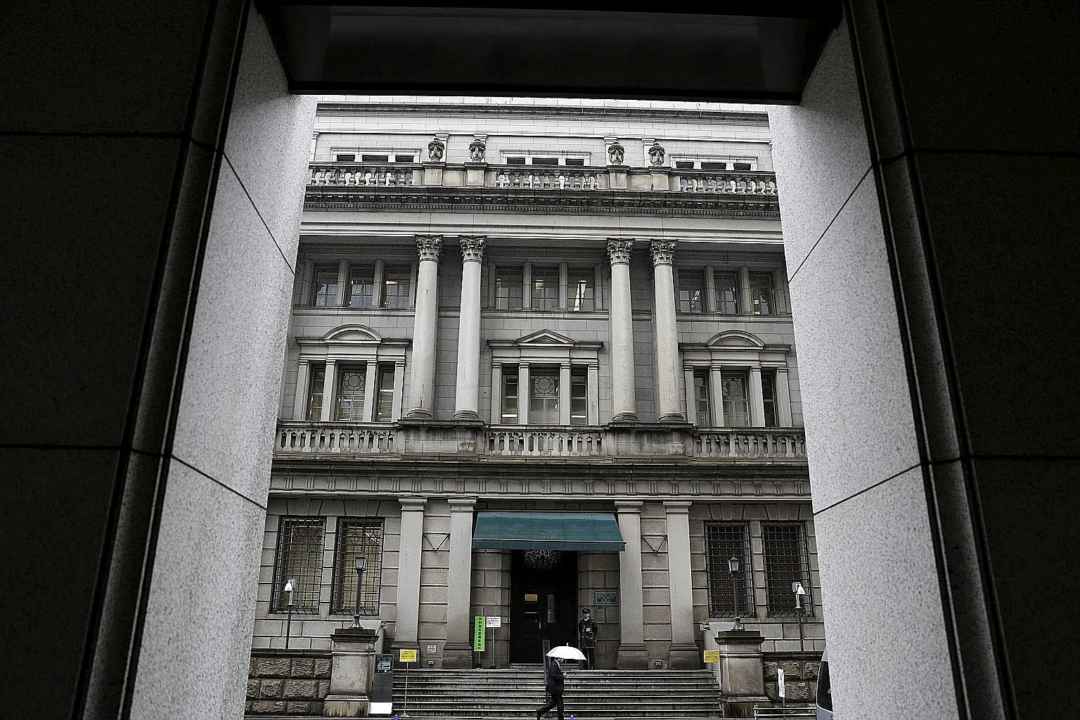 The Bank of Japan's headquarters in Tokyo. It is too early to assess if negative interest rates will work well for economies like Japan and the European Union.