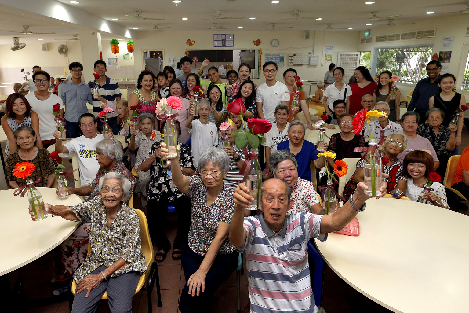 Residents of St John's Home for Elderly Persons received some Valentine's Day love from volunteers yesterday. The National Volunteer and Philanthropy Centre (NVPC) partnered with food distributor Samsui Supplies and Services to deliver food, flowers and s